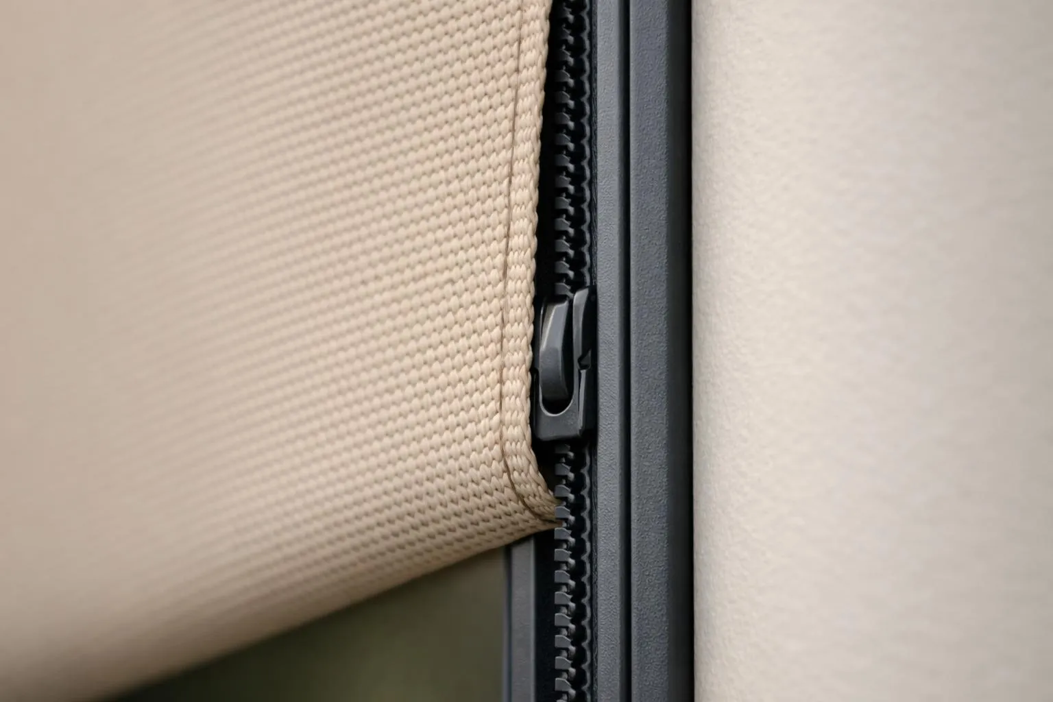 Motorized outdoor roller shade deployed on a Florida lanai